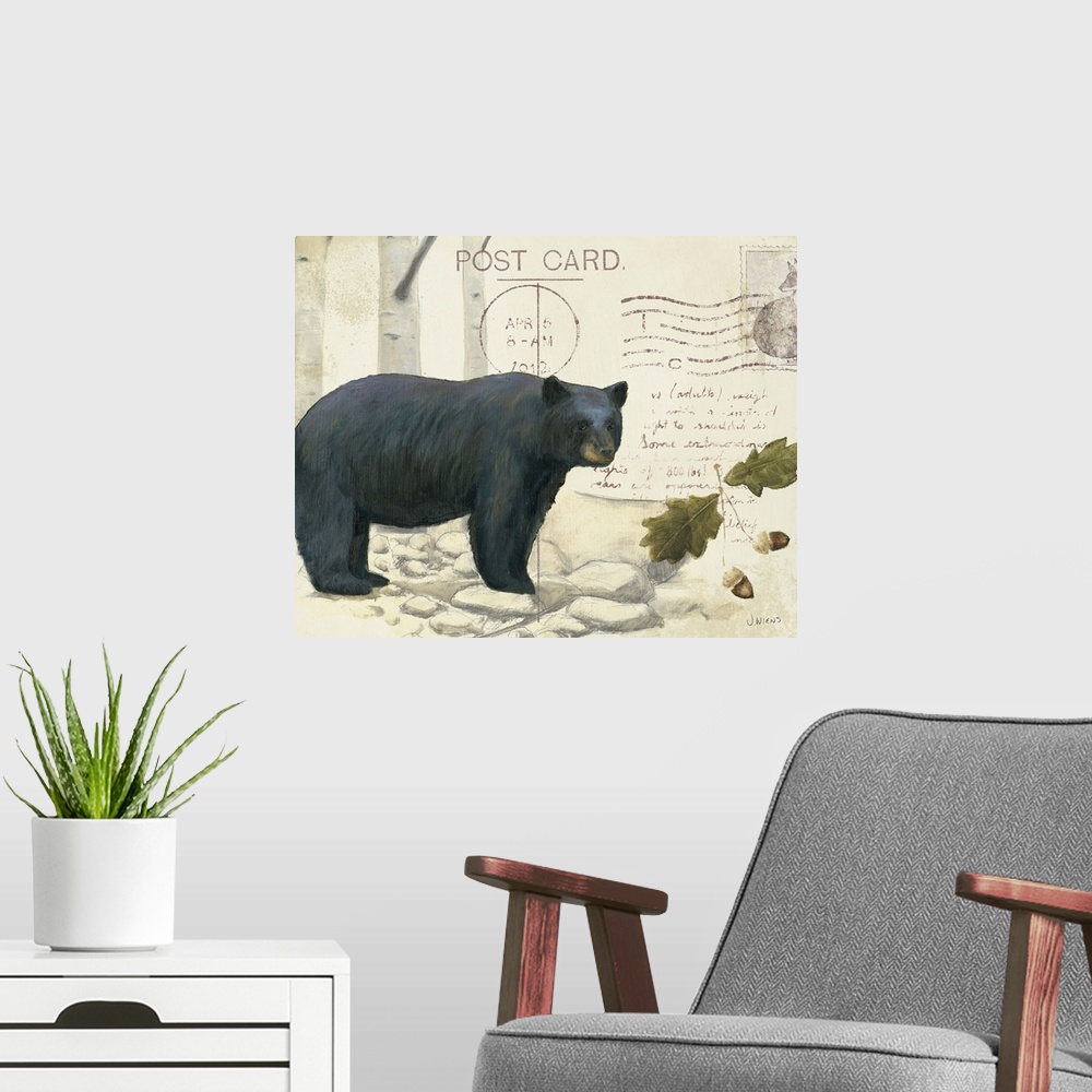 A modern room featuring Cabin decor of a bear and tree details on a vintage looking postcard.