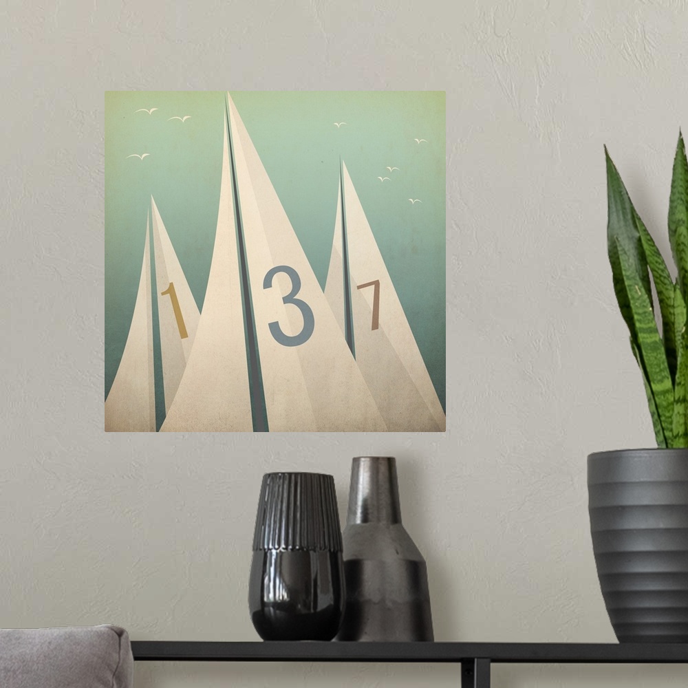 A modern room featuring Contemporary artwork of three sails with numbers on them against a pale green background.