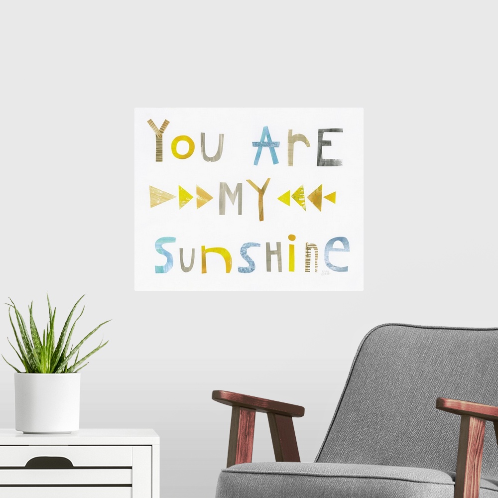 A modern room featuring Whimsy sentiment decor with the phrase "You Are My Sunshine" written in different colors.