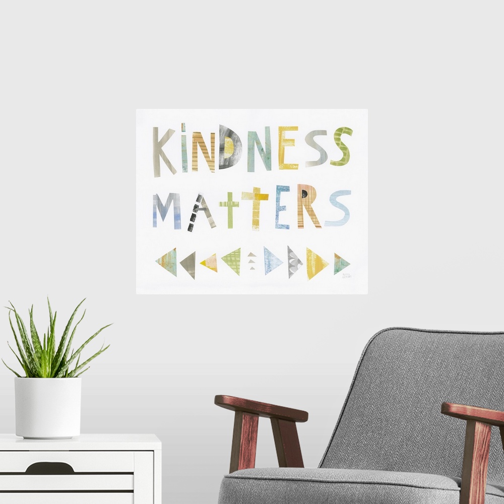 A modern room featuring Whimsy sentiment decor with the phrase "Kindness Matters" written in different colors.