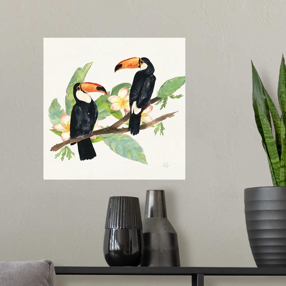 A modern room featuring Square watercolor painting of two toucans on a branch with green tropical leaves and pink orchids.