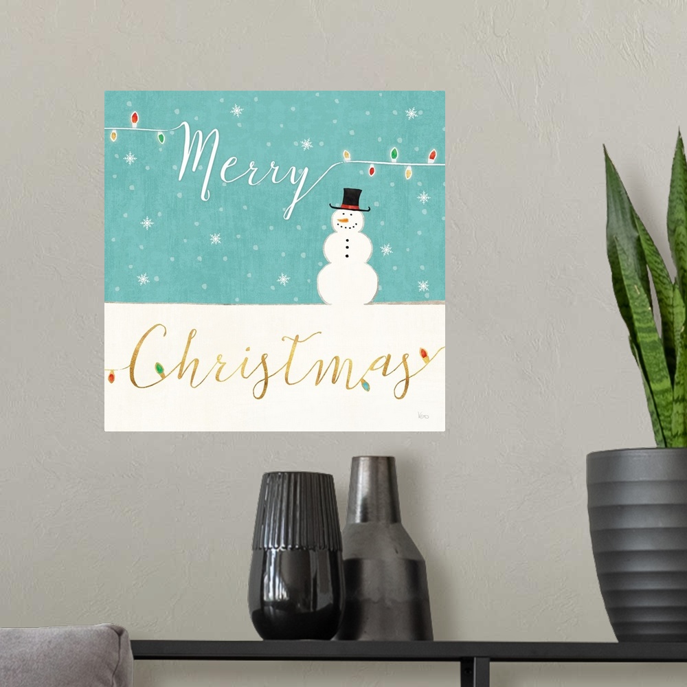 A modern room featuring Square Christmas decor that reads "Merry Christmas" in a snowy scene with a snowman.