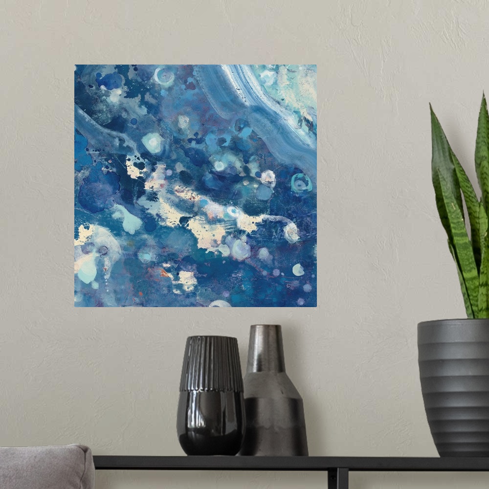 A modern room featuring Contemporary abstract painting resembling crashing ocean waves.
