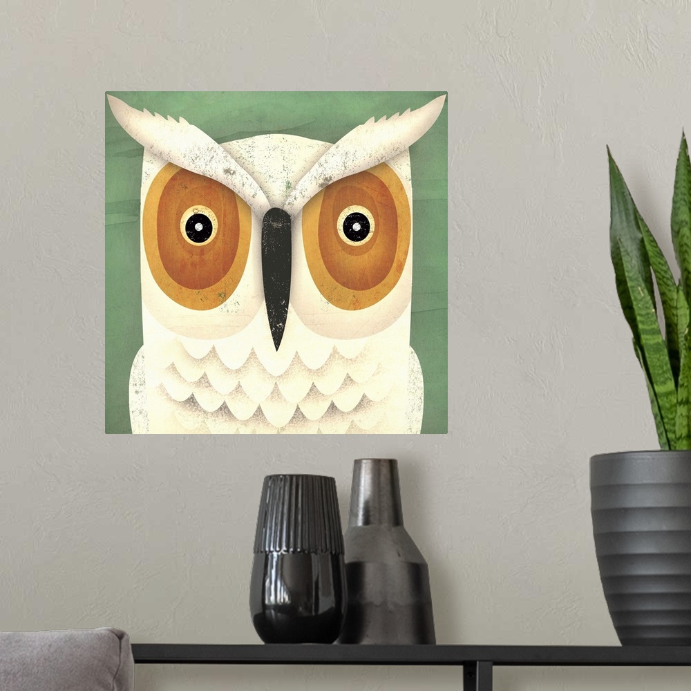 A modern room featuring Contemporary artwork of a white owl with an intense gaze in its eyes.