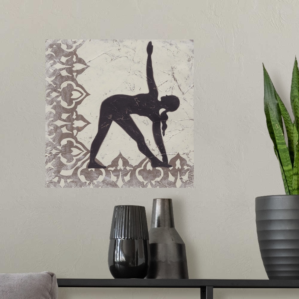 A modern room featuring Decorative print of a yoga pose.
