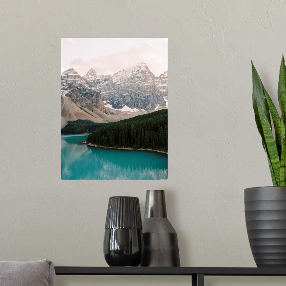 A modern room featuring Photograph of the trees and moutains surrounding Moraine Lake, Banff national park, Canada.