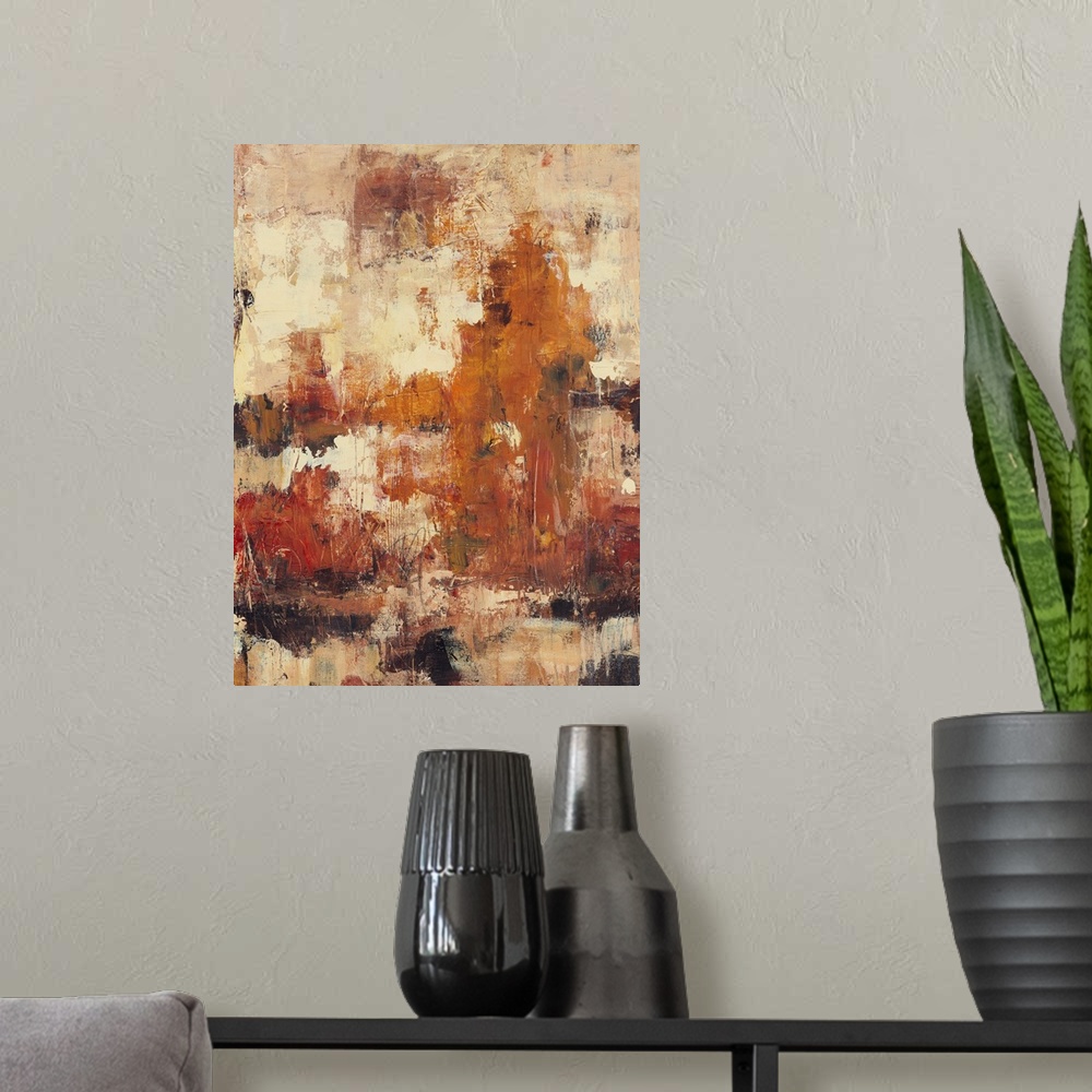 A modern room featuring Abstract artwork that uses autumn colors splashed onto a neutral background with a distressed look.