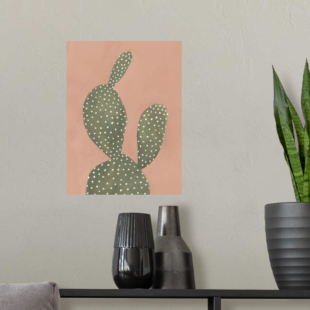 A modern room featuring Contemporary painting of a cactus on a coral colored background.