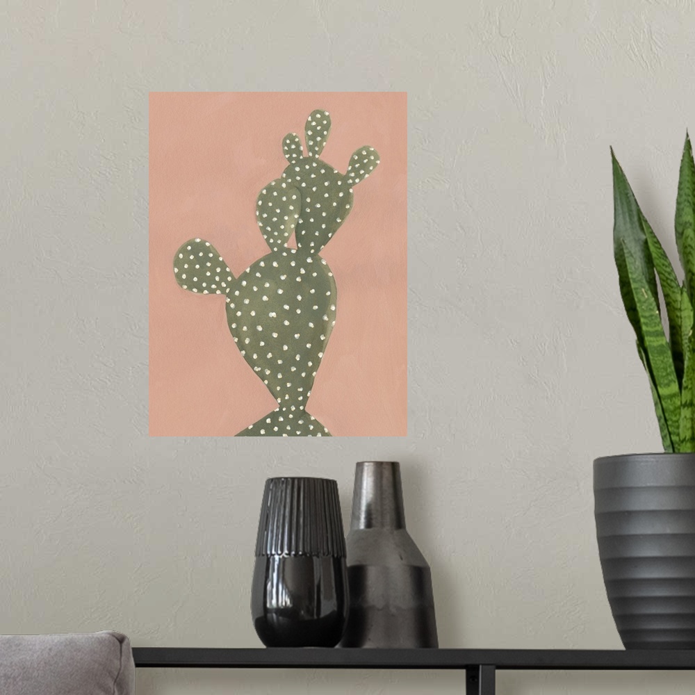 A modern room featuring Contemporary painting of a cactus on a coral colored background.