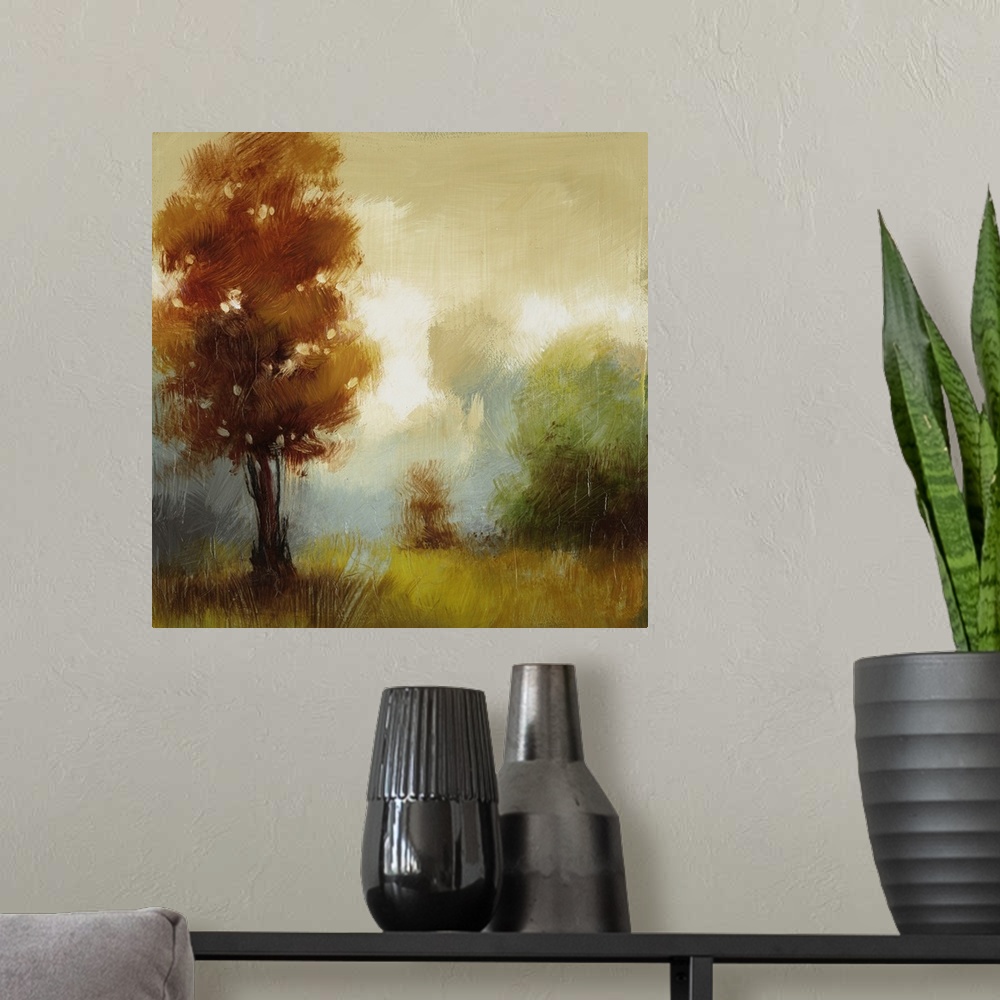 A modern room featuring Contemporary painting of several trees in fall colors in a foggy field.