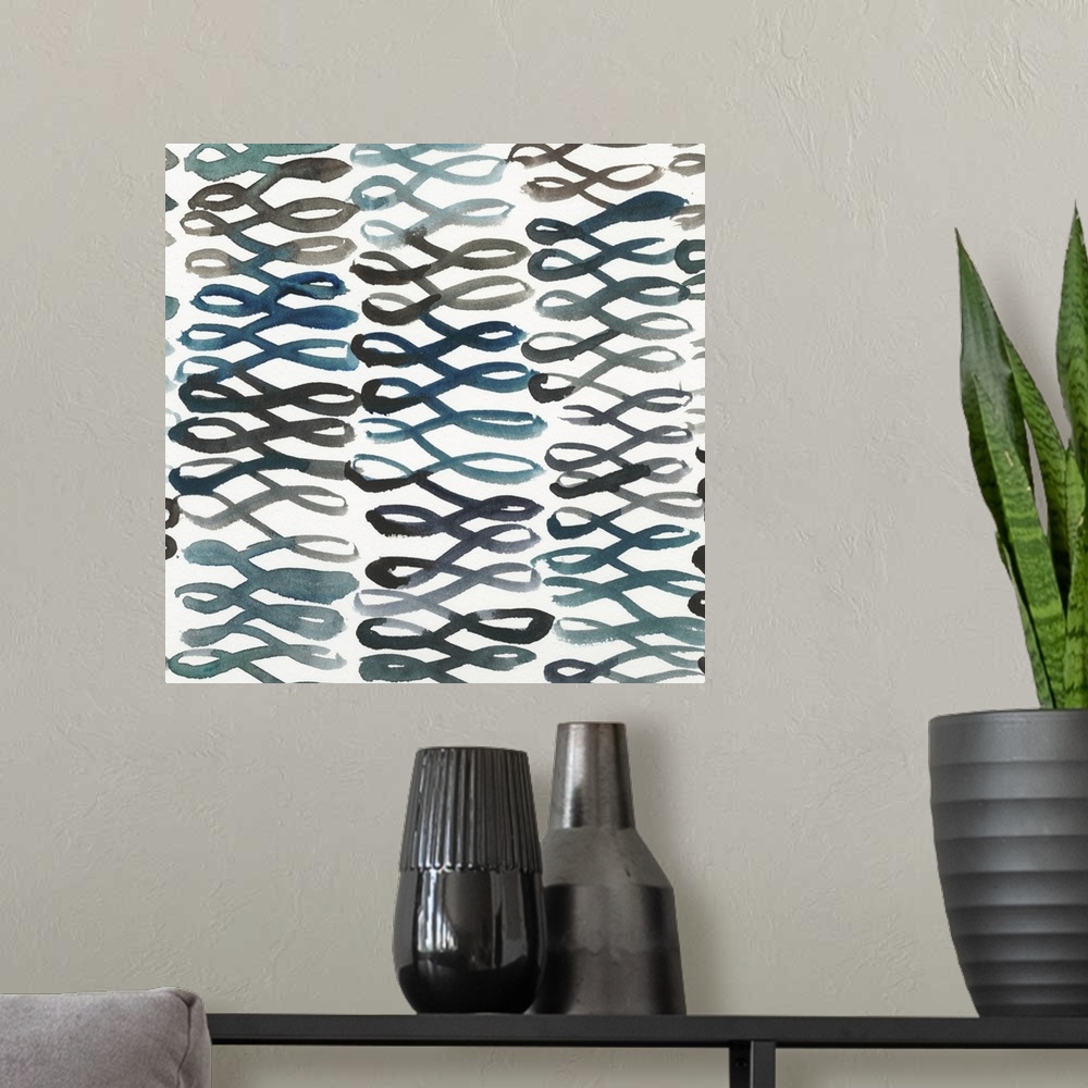 A modern room featuring Square abstract decor with a loopy lined pattern made in shades of blue and black.