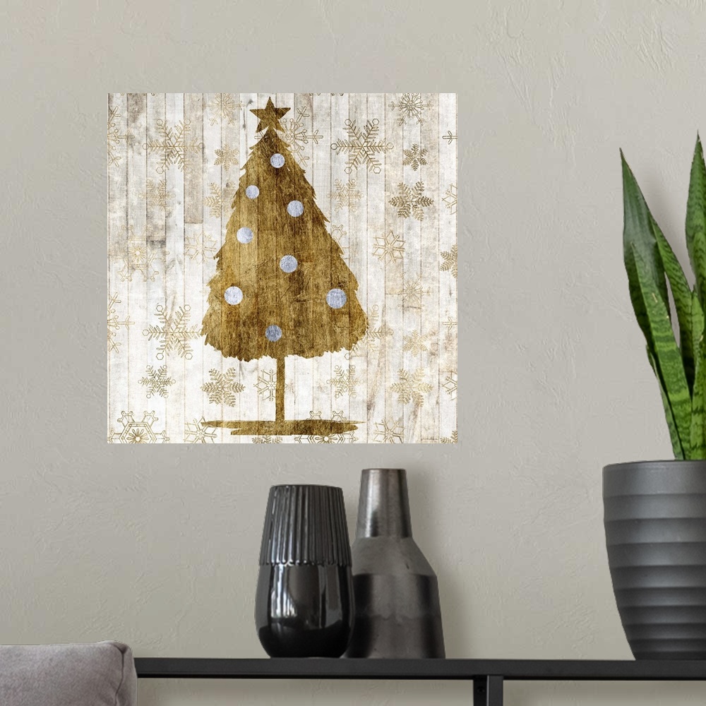 A modern room featuring Contemporary Christmas decor of a tree in gold tones.
