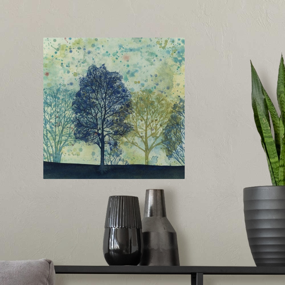 A modern room featuring Watercolor painting of silhouetted trees in cool tones against a green and speckled sky.