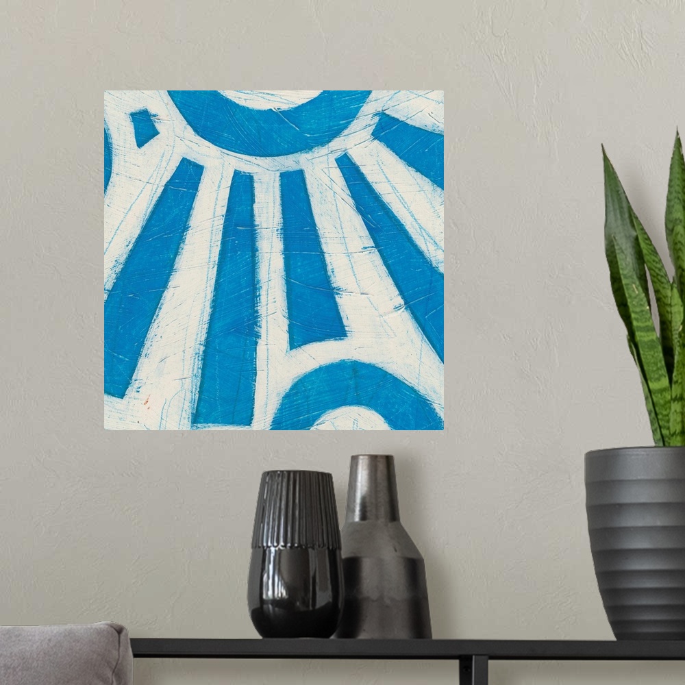 A modern room featuring Mid-century inspired painting of abstract shapes in vibrant colors.