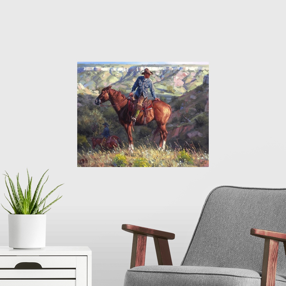 A modern room featuring Contemporary painting of a cowboy on a chestnut horse overlooking a western valley landscape.