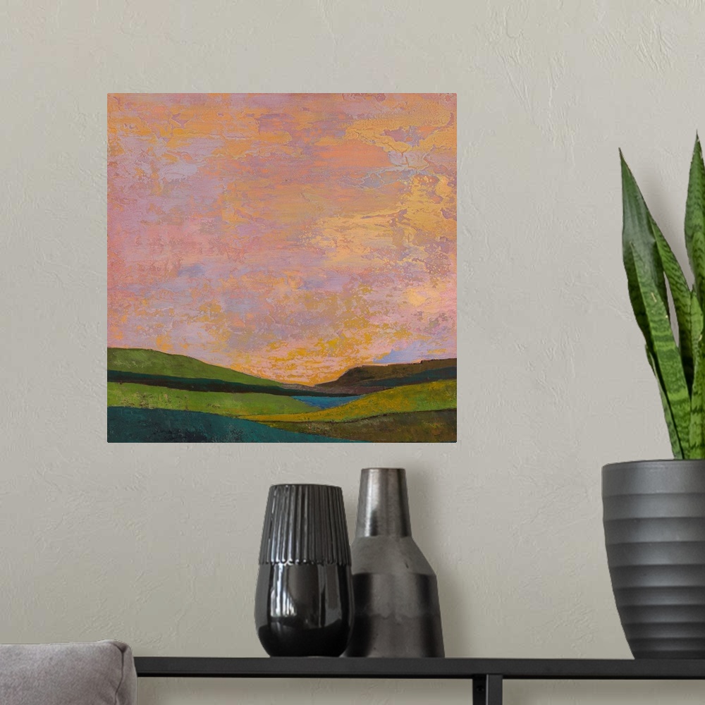 A modern room featuring Contemporary abstract painting using color to and shape to suggest a landscape.