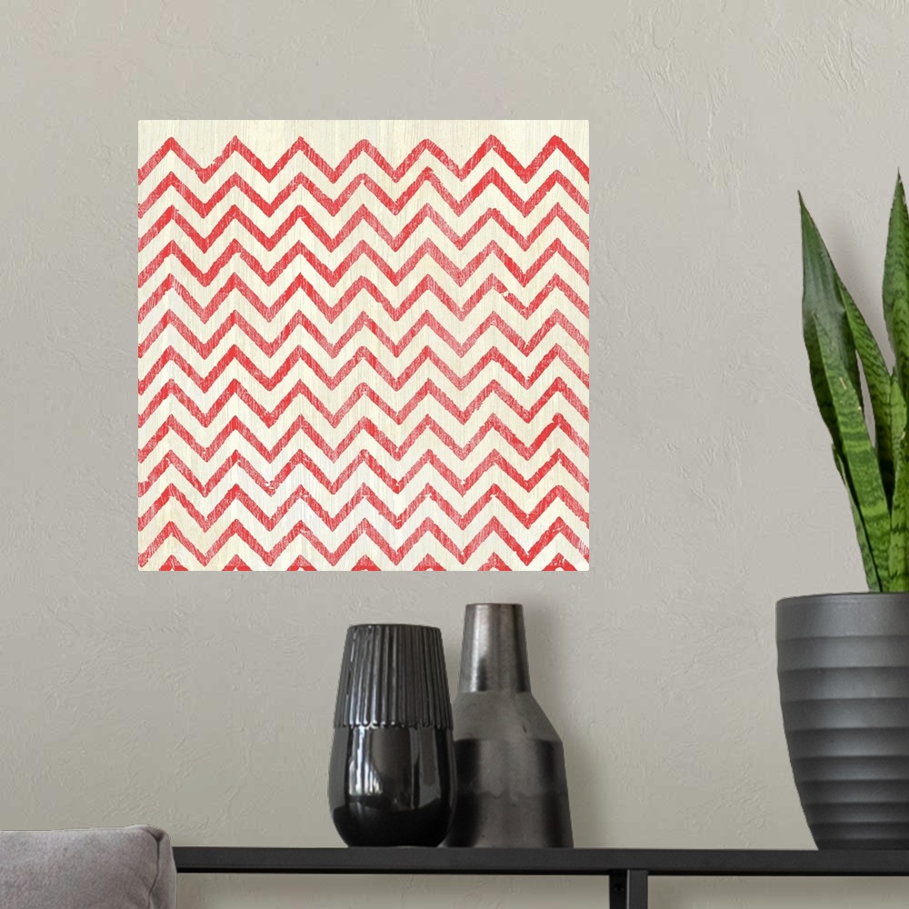 A modern room featuring Square decorative artwork of a repetitive pattern of a chevron design with a light streak overlay.