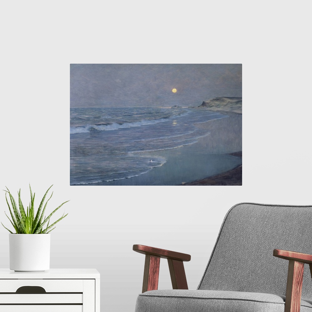 A modern room featuring Huge classic art depicts the waves of an ocean crashing into the sandy shoreline of a beach and r...