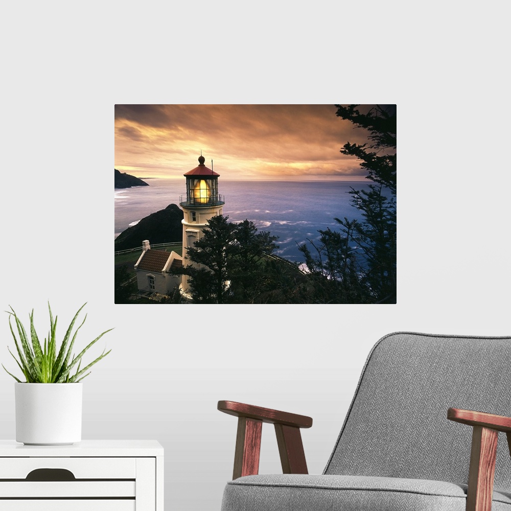 A modern room featuring Oregon, View of Heceta Head Lighthouse at sunset.