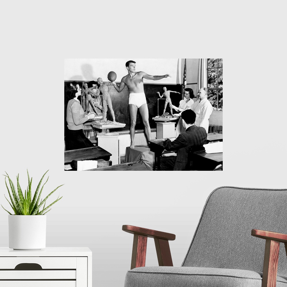 A modern room featuring Warner Bros.' Ronald Reagan, corralled into posing for a University of Southern California sculpt...