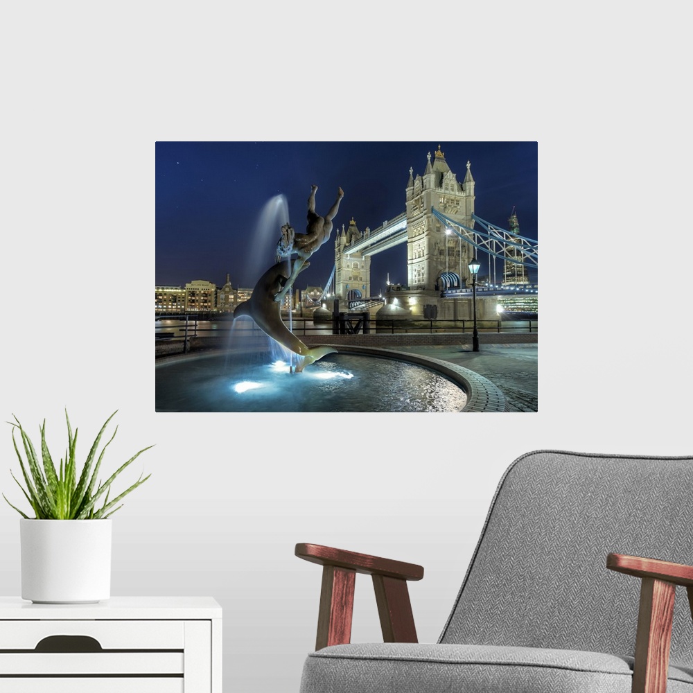 A modern room featuring Tower Bridge with  dolphin fountain in London.