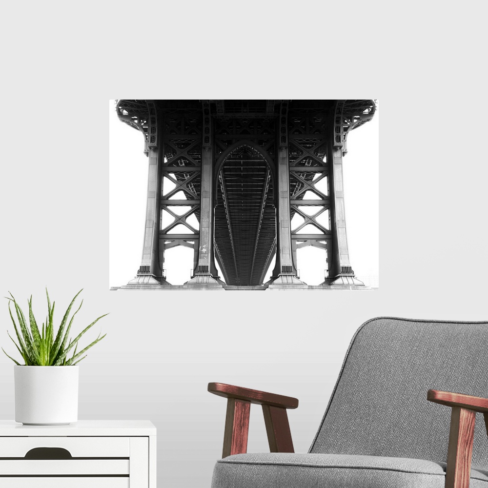 A modern room featuring View from underneath Manhattan Bridge. Black and white image.