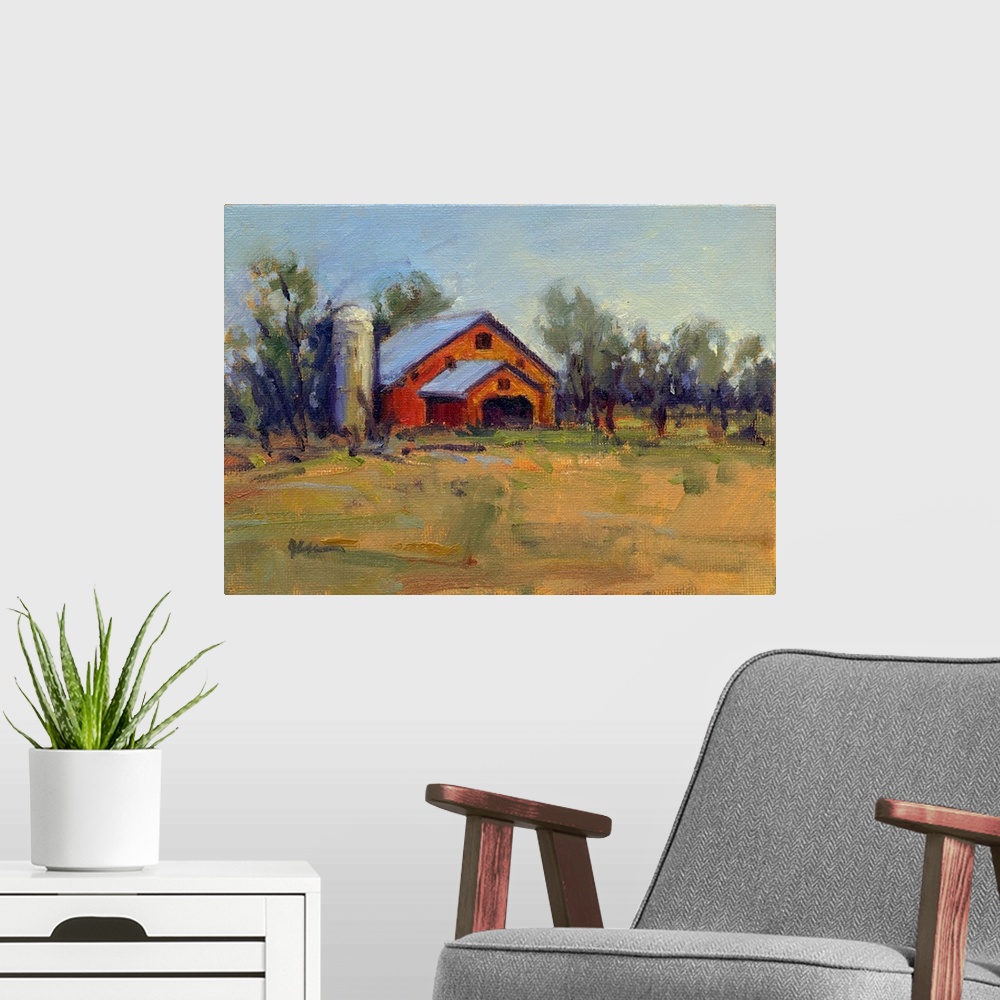 A modern room featuring A horizontal contemporary painting of a barn lined with trees in the afternoon light.