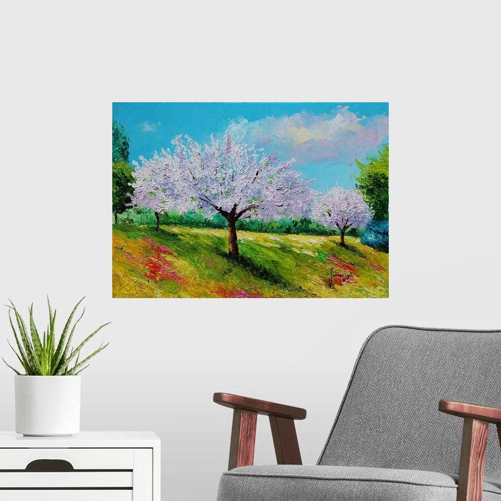 A modern room featuring Painting of a rural landscape of purple flowering trees.