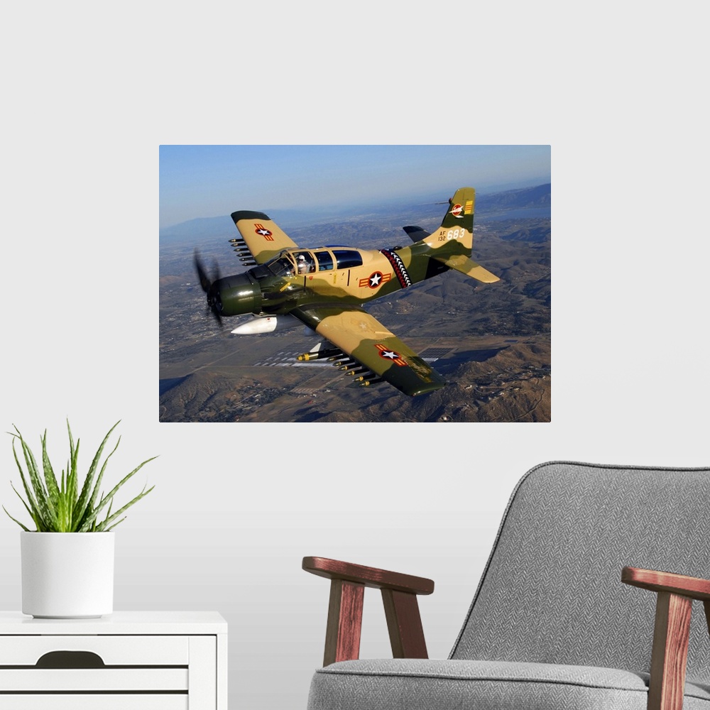 A modern room featuring AD-5 Skyraider flying over Chino, California.