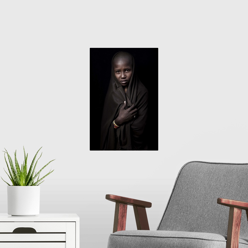 A modern room featuring Portrait of a young Ethiopian girl wearing a veil.