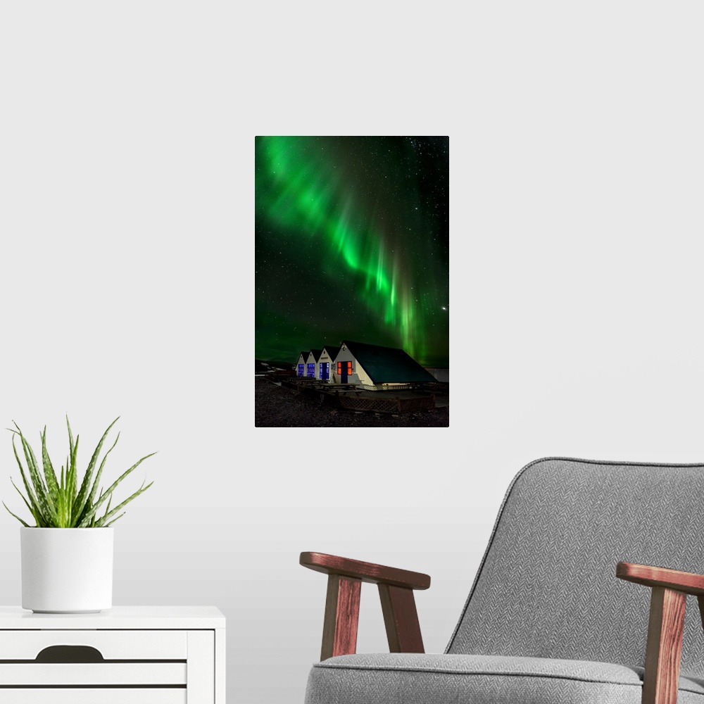 A modern room featuring Aurora Borealis