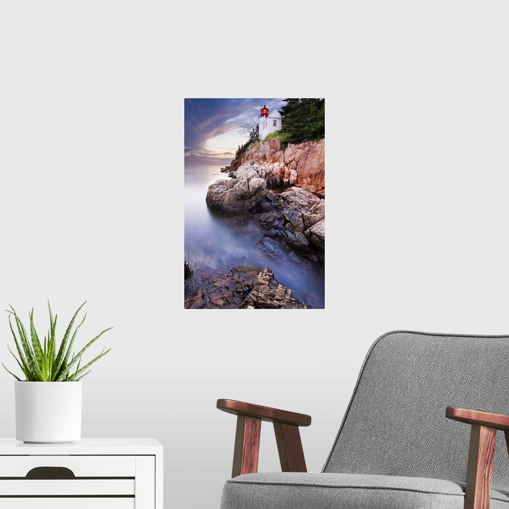 A modern room featuring Bass Harbor Lighthouse on the edge of a rocky cliff on the coast of Acadia National Park, Maine.