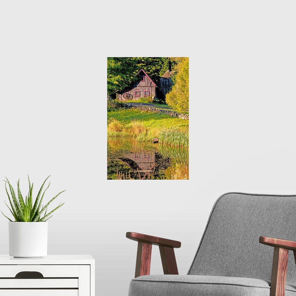 A modern room featuring An Old Barn Reflected In Pond; Ville De Lac Brome, Quebec, Canada
