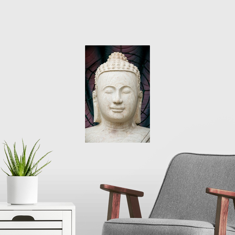 A modern room featuring Buddha statue.