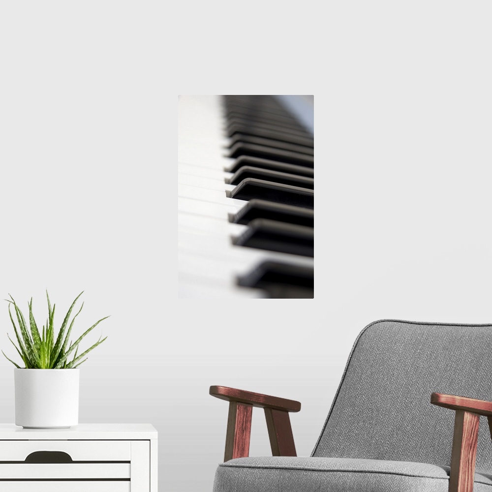 A modern room featuring Close Up Of Piano Keyboard.