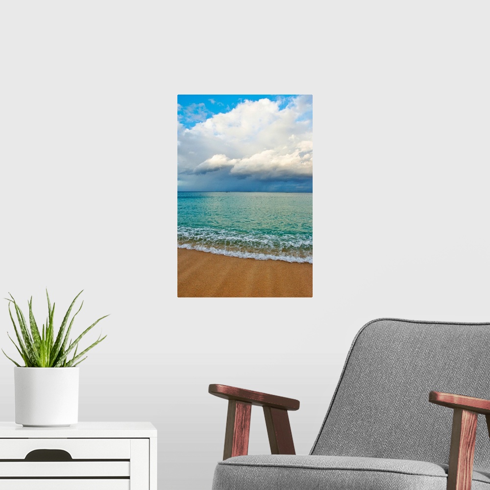 A modern room featuring This photograph is taken on a beach in Hawaii of immense clouds that hang in the sky over a teal ...