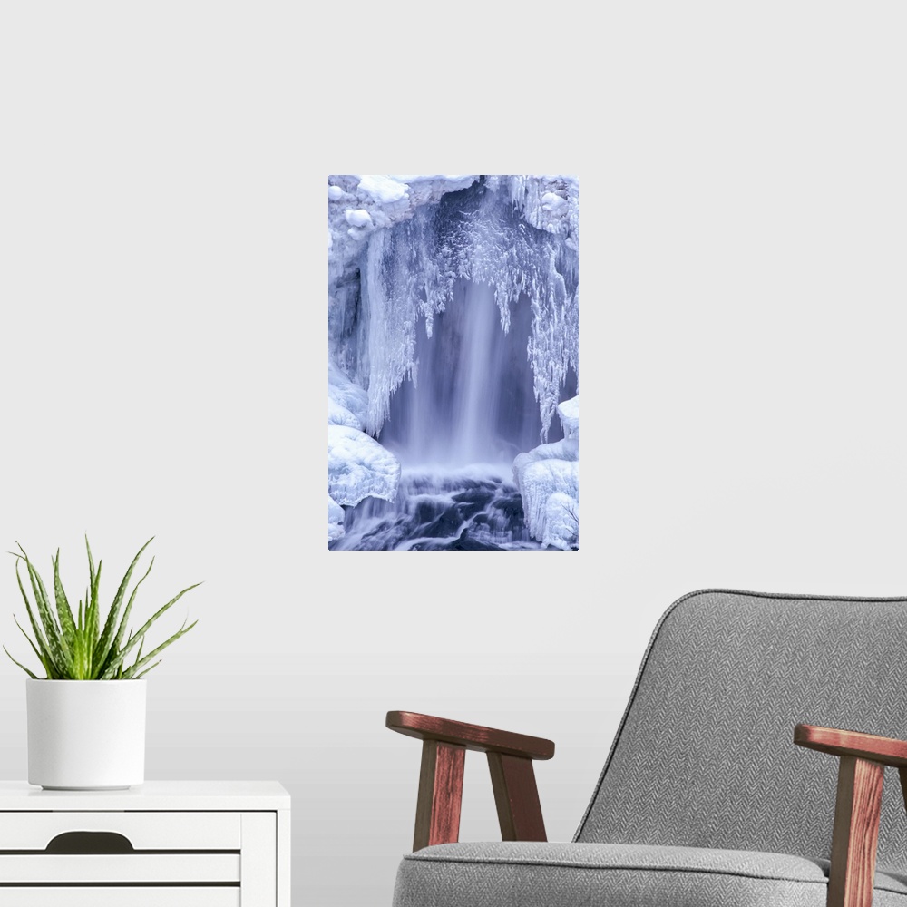A modern room featuring Icy crust formation over the Undine Falls in winter Yellowstone National Park, United states of A...