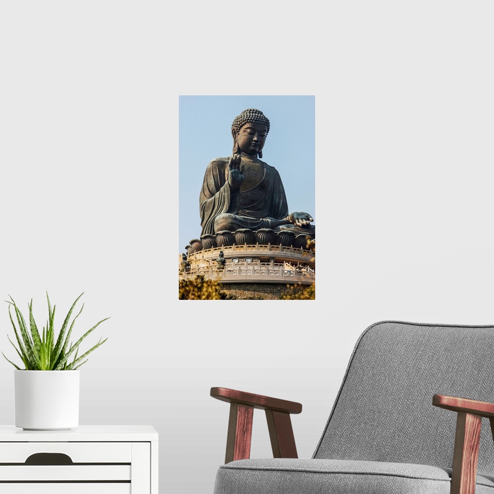A modern room featuring Po Lin Monastery. Statue of the Buddha, the largest in Asia.