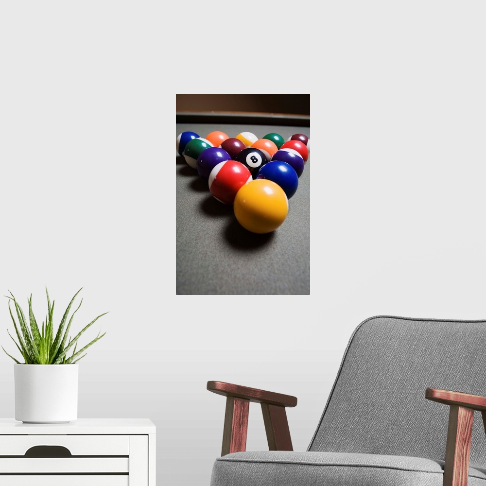 A modern room featuring Pool Balls On A Billiard Table With The Eight Ball Facing Upwards