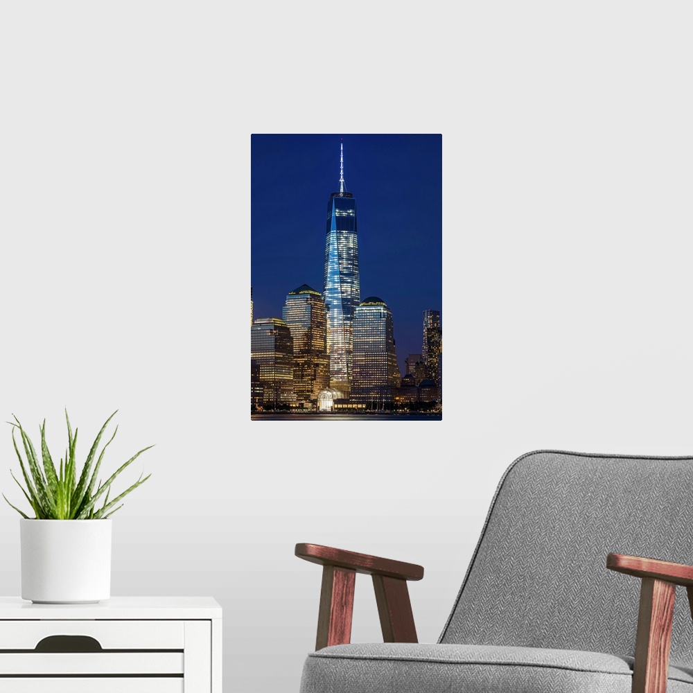 A modern room featuring The new World Trade Center at twilight, viewed from Jersey City, New Jersey. New York City, New Y...