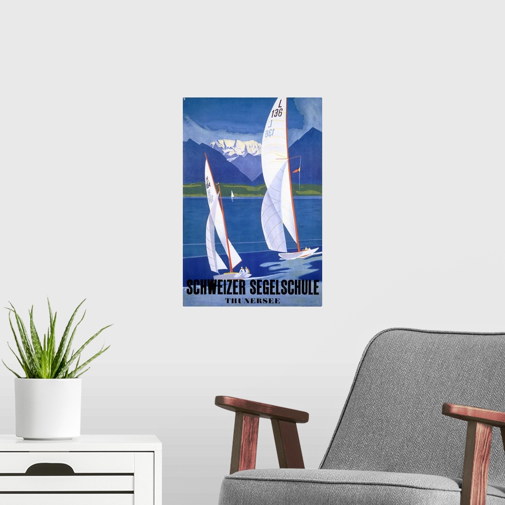 A modern room featuring Tall wall art of two sailboats sailing from left to right with layered mountains in the distance ...