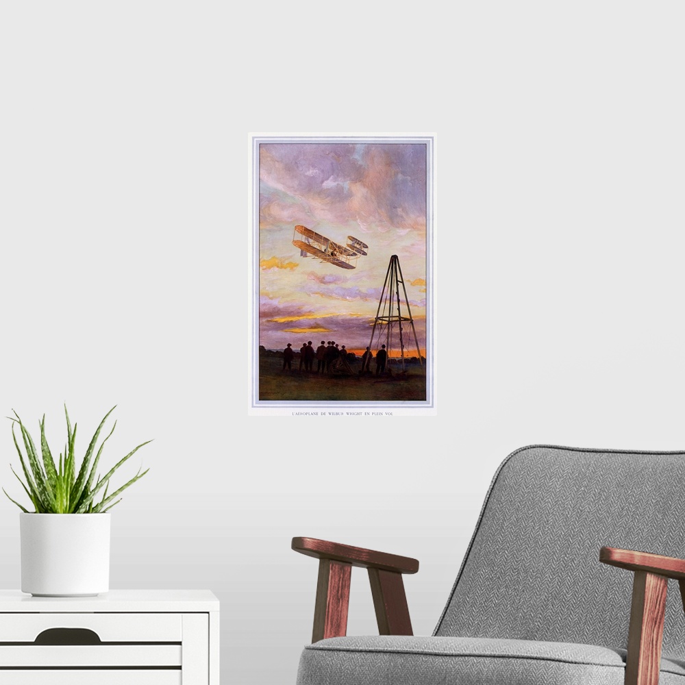 A modern room featuring Big, vertical, vintage wall hanging of Wilbur Wright Aviation.  A group of people look upward at ...