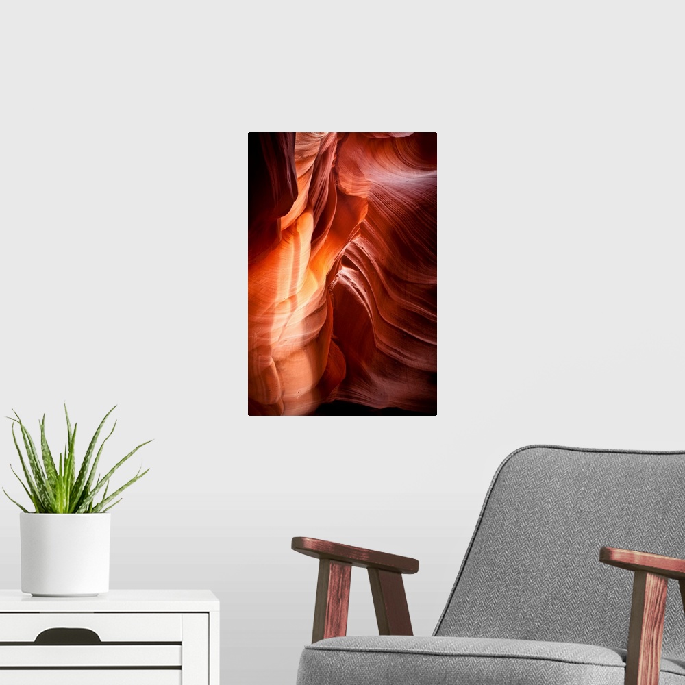 A modern room featuring Landscape photograph of sandstone walls inside a canyon cave.