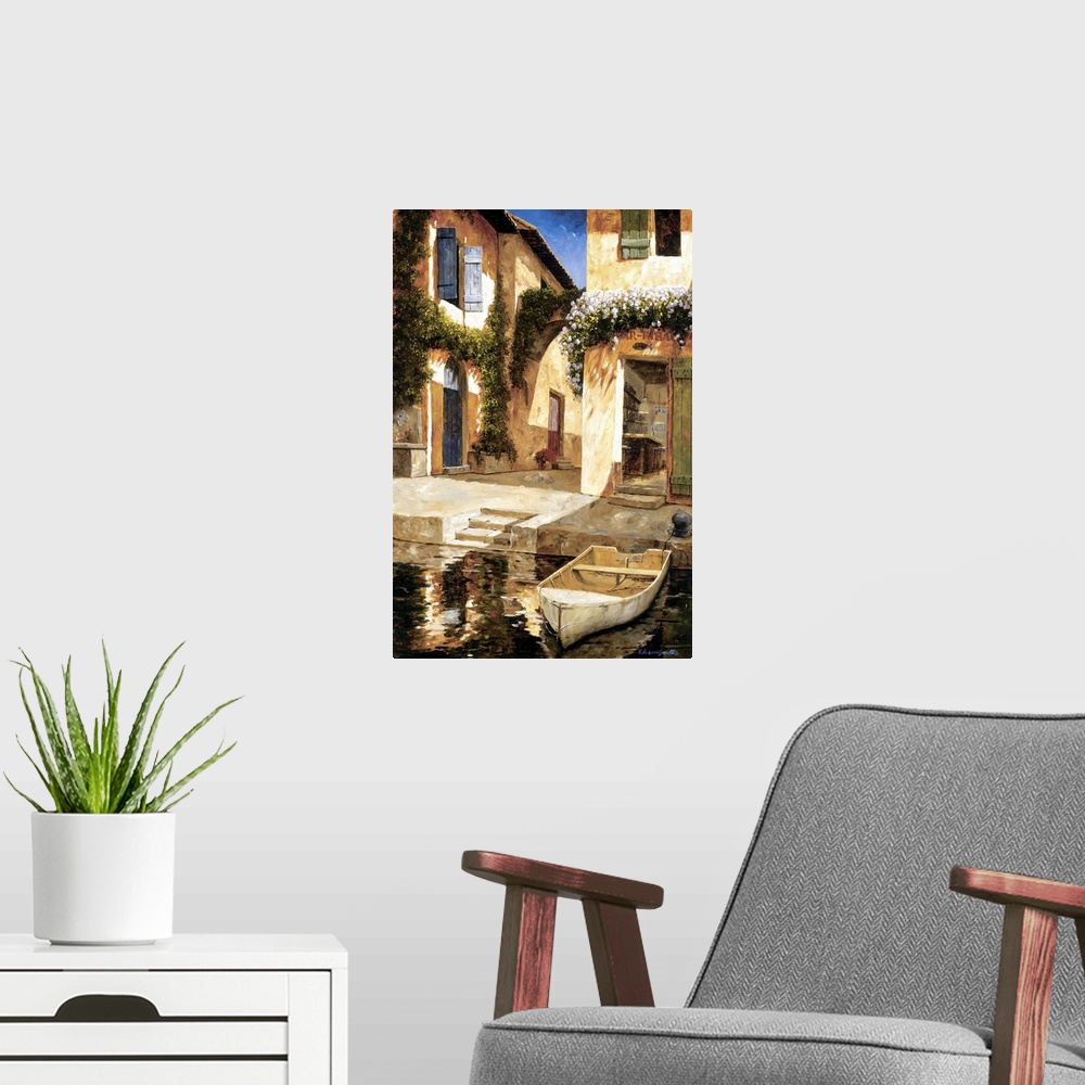 A modern room featuring Painting of a boat docked near stairs in a European village.
