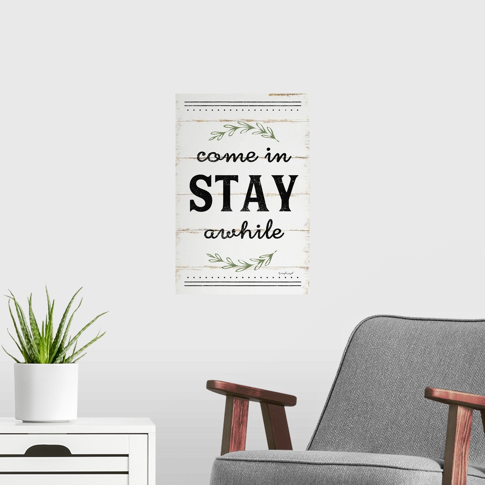 A modern room featuring A digital illustration of "Come in STAY awhile" on a white shiplap background.