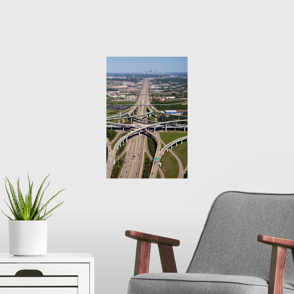 A modern room featuring Aerial view of the freeway interchange of Interstate 45 and the State Highway Beltway 8 in Housto...