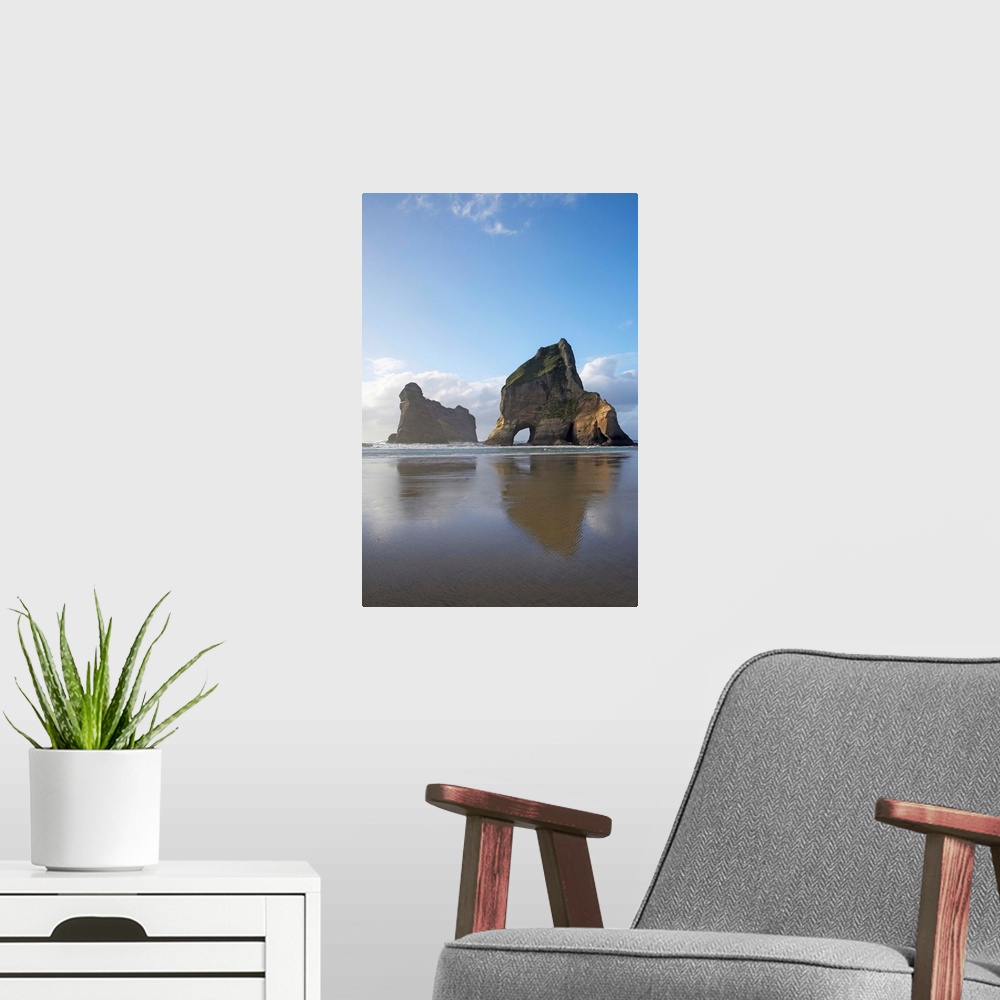 A modern room featuring Archway Islands Reflected in Wet Sands of Wharariki Beach, near Cape Farewell, North West Nelson ...