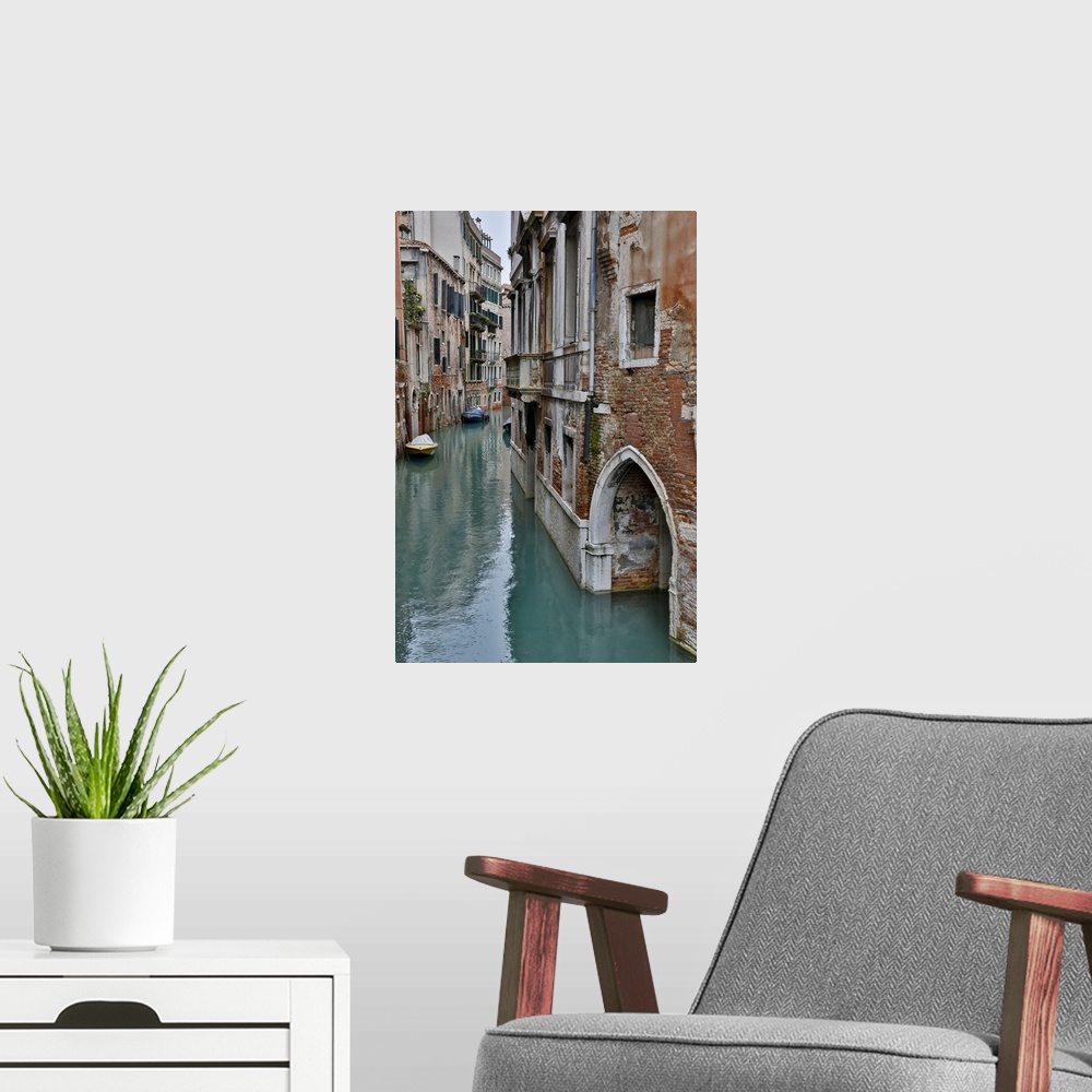 A modern room featuring Canal and Bridges with boats, Venice, Italy.