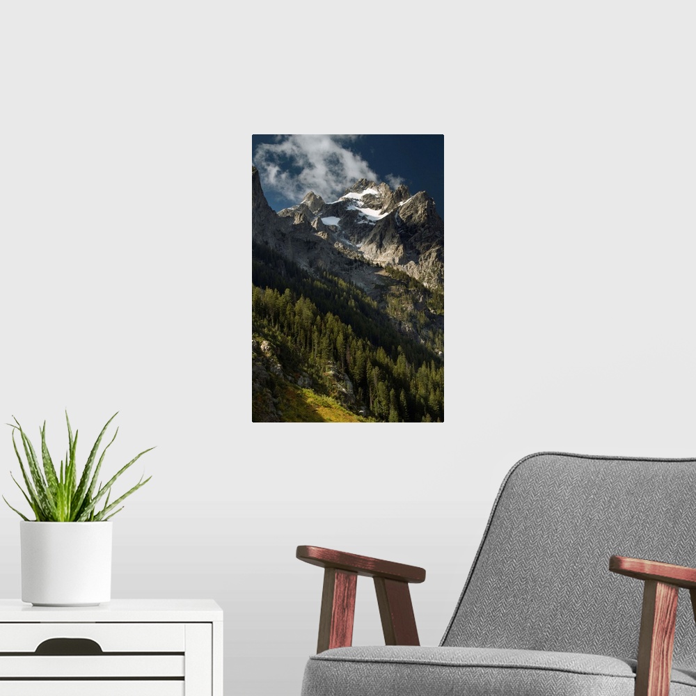 A modern room featuring Clouds around the High Peak of Mount Owen, Grand Teton National Park, Wyoming, USA.