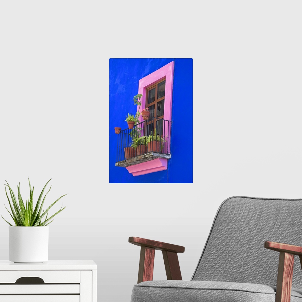 A modern room featuring Colorful window on a building in the city of Puebla, Puebla, Mexico.
